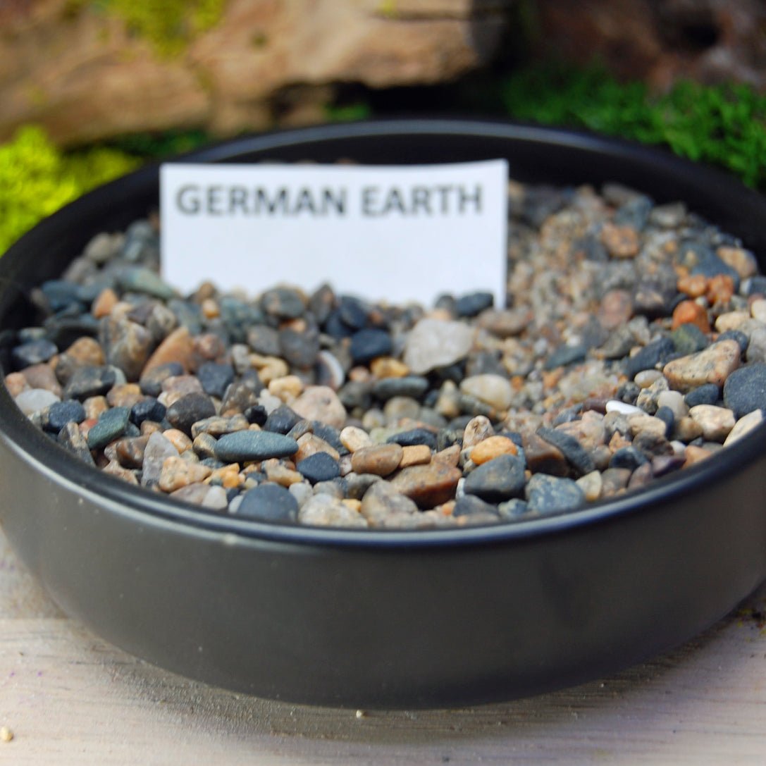 GERMAN Beach Sand Wedding Rings - How Earthy Materials Like Sand, Dirt and Rocks Can Symbolize Your Unique Love Story - Minter and Richter Designs