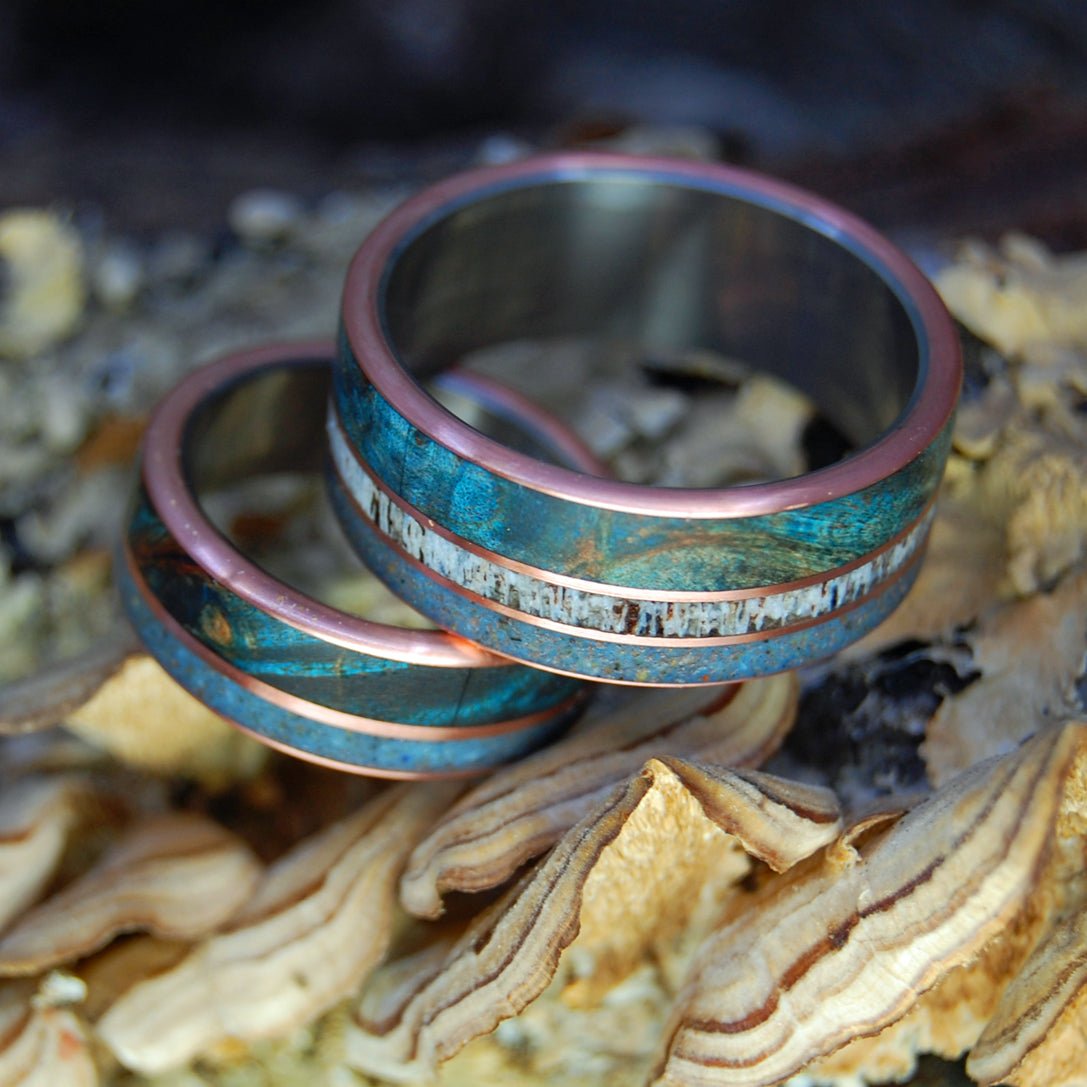 God Loves The Caribou Of Lake Superior | Caribou Antler, Lake Superior Beach Sand, Copper, Blue Maple Wood - Titanium Wedding Ring Set - Minter and Richter Designs